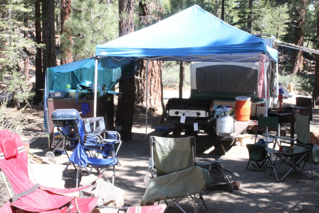 Our camp kitchen, and the back end of the pop-up trailer.